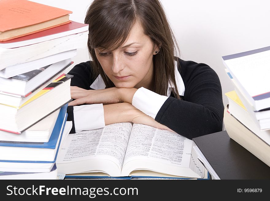 Teenage girl studying at the desk. Teenage girl studying at the desk