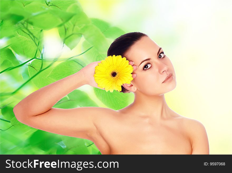 Portrait of Fresh and Beautiful woman with flower