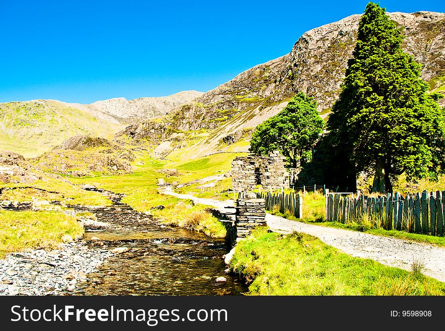 Stream with slate wall in north wales. Stream with slate wall in north wales