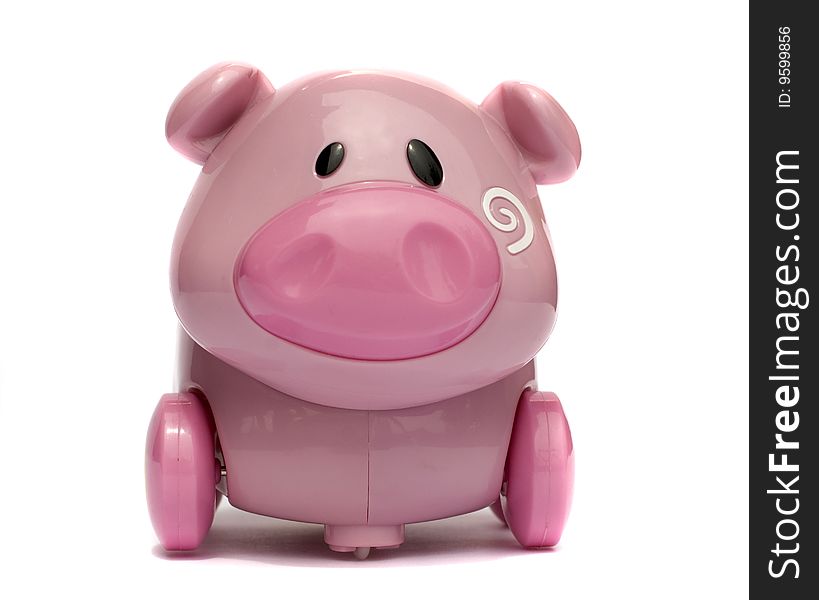 Children's toy: a musical plastic pig. Children's toy: a musical plastic pig
