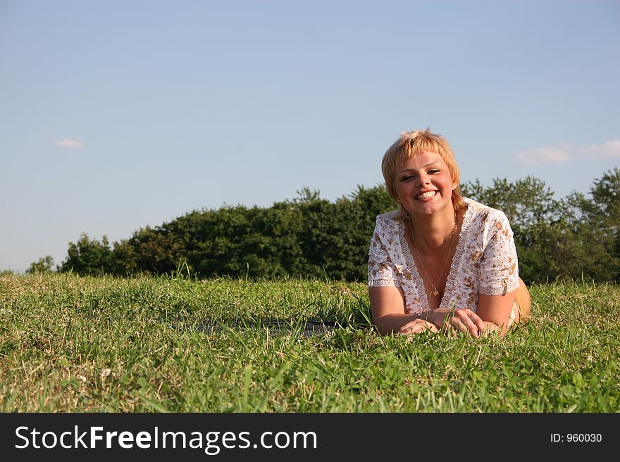 Smile girl on grass