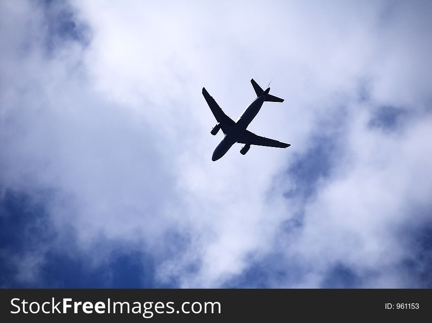 Airplane taking off in clouds. Airplane taking off in clouds