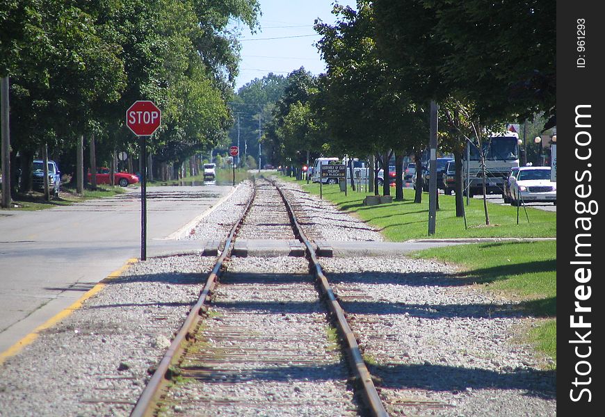 Looking down the train tracks in downtown East Tawas Michigan. Looking down the train tracks in downtown East Tawas Michigan.