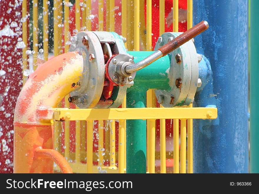 Colorful Lever at a water play area or waterpark