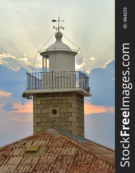 Lighthouse tower in the clouds