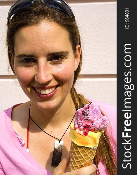 Woman gazing with ice-cream. Woman gazing with ice-cream