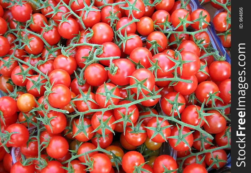 Red tomatoes on market place in Paris.