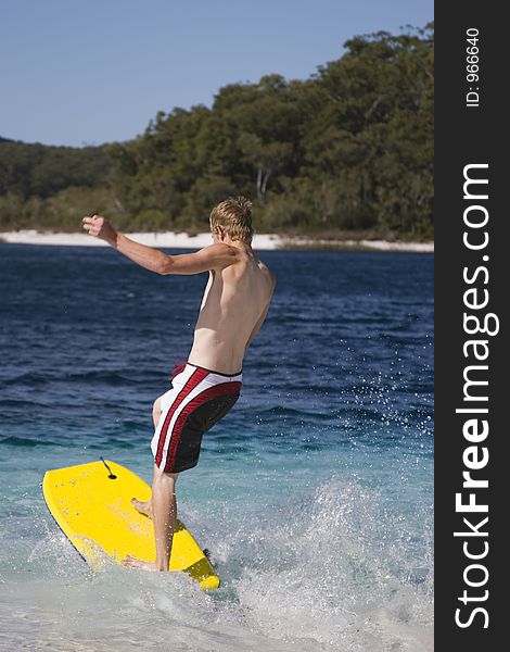 Surfing in a lake on a body board. Or at least giving it a go while on holiday at Fraser Island. Surfing in a lake on a body board. Or at least giving it a go while on holiday at Fraser Island.