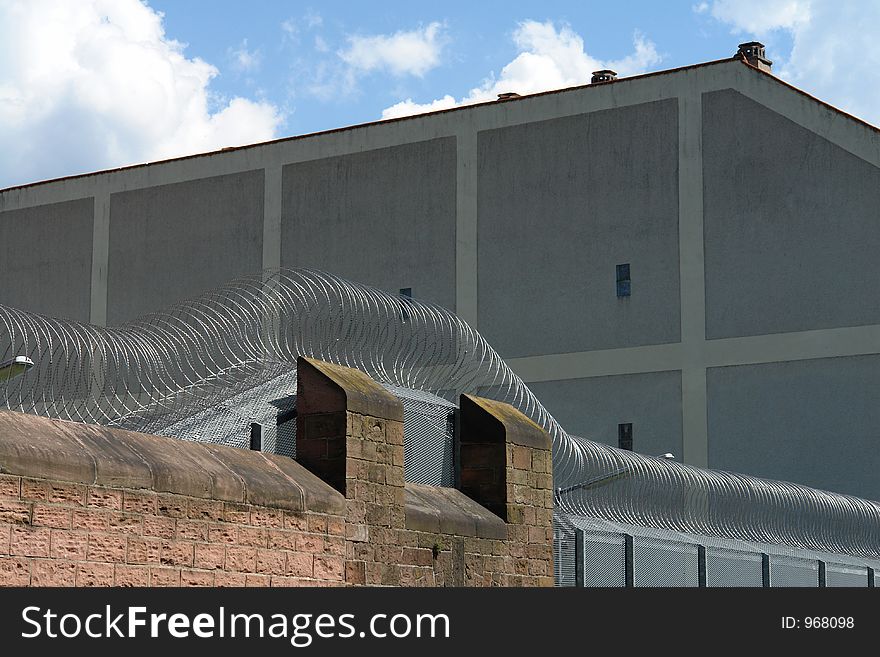 The silver lining of a barbed wire fence at a prison in Germany