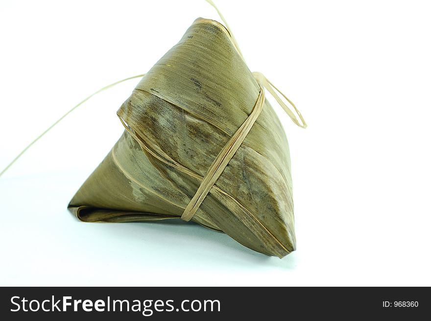 Sticky rice pocket with spice and meat in bamboo leaf. a popular dish amongst chinese. Sticky rice pocket with spice and meat in bamboo leaf. a popular dish amongst chinese