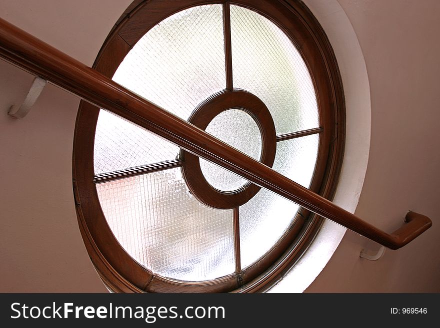 Round window staircase in a building. Round window staircase in a building