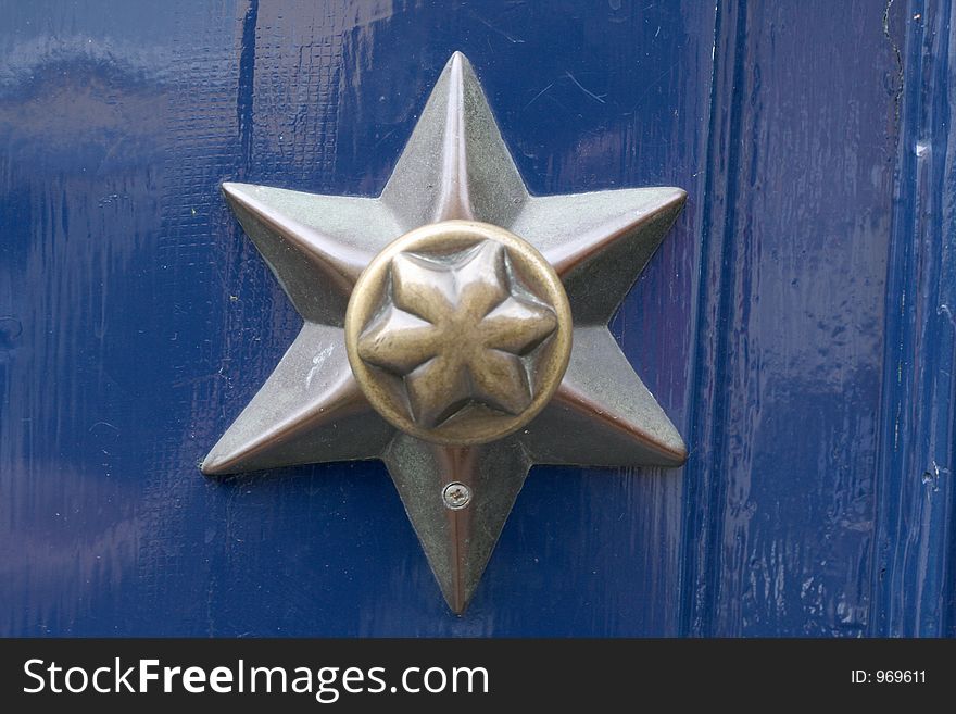 Star shaped door handle, bruges, belgium. Star shaped door handle, bruges, belgium