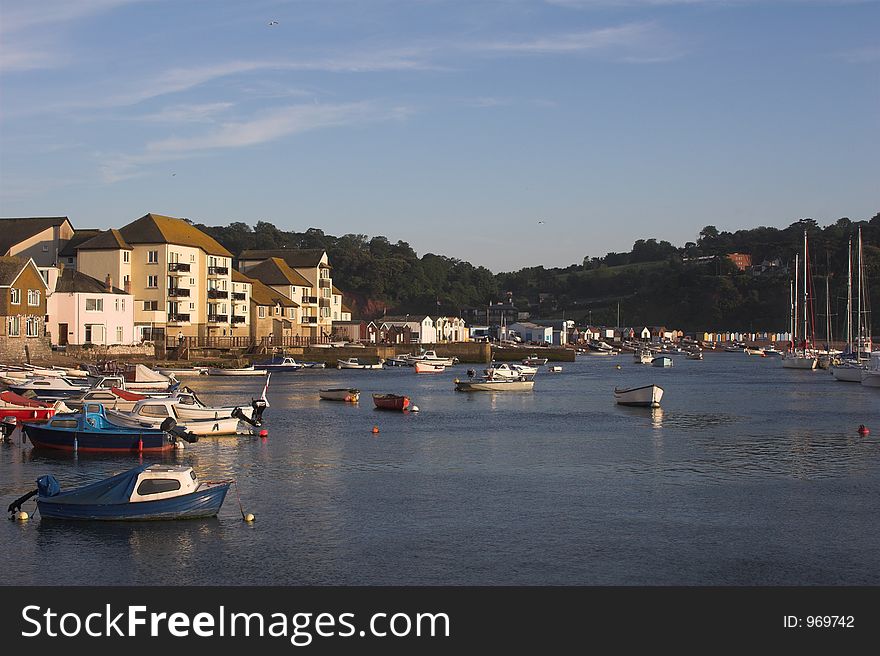 Estuary harbour with boats & houses. Estuary harbour with boats & houses