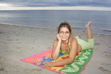 Beautiful Lady Smiling, Laying On A Towel (I) Royalty Free Stock Photo Beautiful Lady Smiling, Laying On A Towel (I) Royalty Free Stock Photo