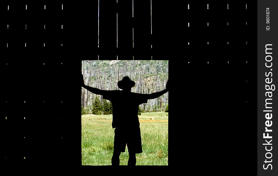 Silhouette Of Man, Old Barn, California