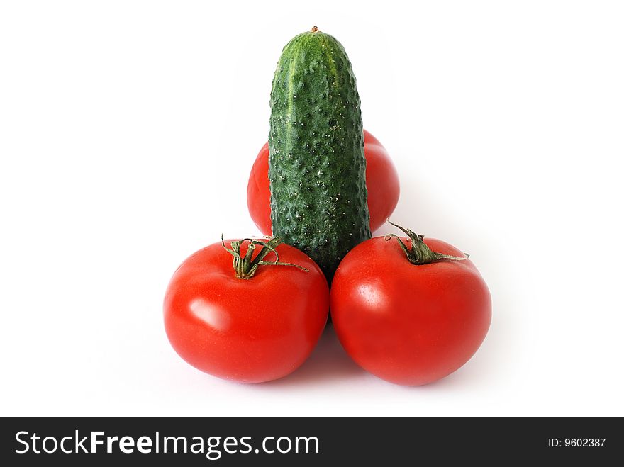 Cucumber and tomato isolated on white background