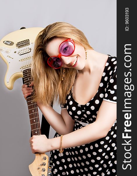 Girl having fun with guitar