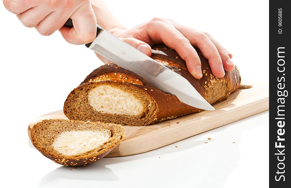 Hand the cutting bread loaf with a knife