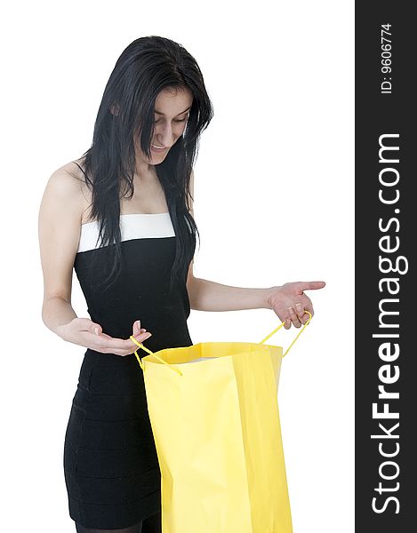 Young girl holding yellow bag