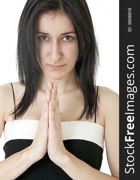 Beautiful young girl is praying