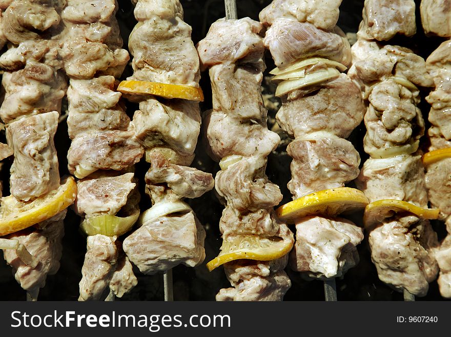 Shish kebab on skewers in a brazier