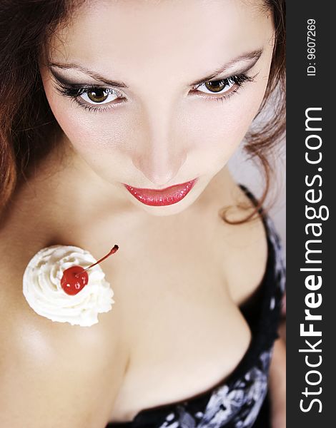 young girl with red cherry on her shoulder. young girl with red cherry on her shoulder