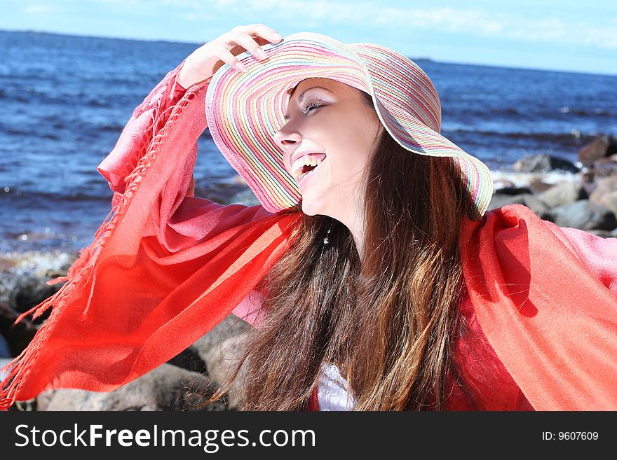 Funny young woman near the sea