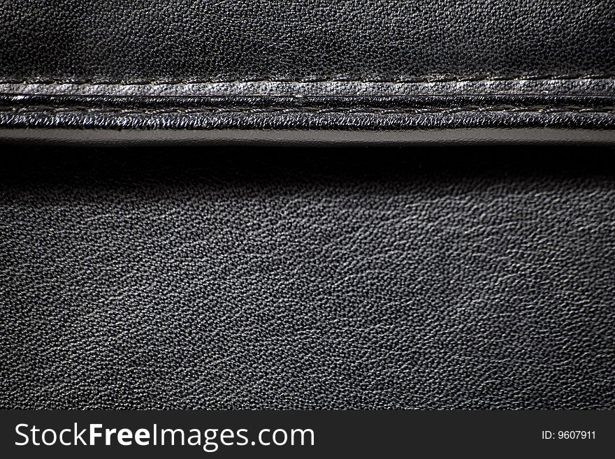 Leather texture with a seam above