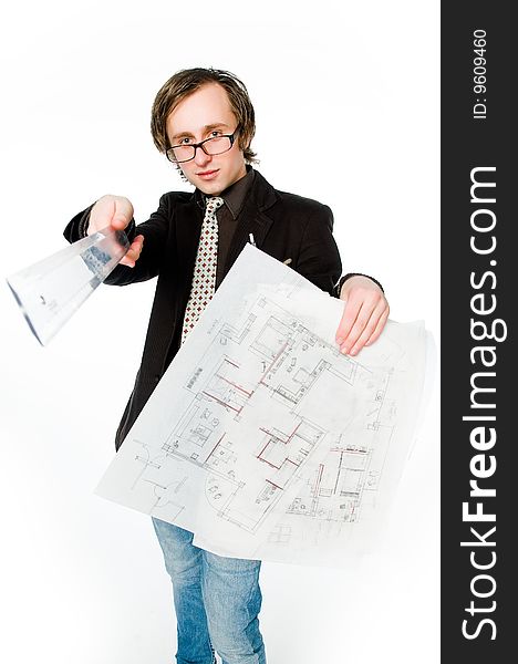 Young architect with sketch and ruler