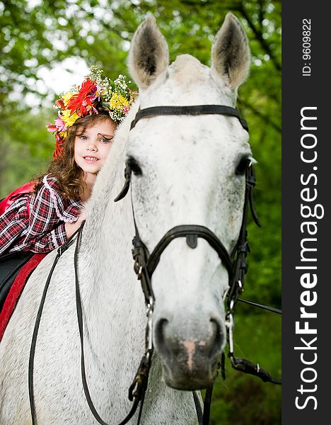 Little girl in floral wreath