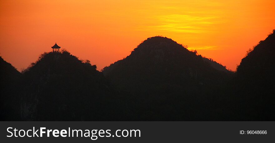 Sunrise over Putuo mountain in Guilin, Guangxi province of China. Sunrise over Putuo mountain in Guilin, Guangxi province of China