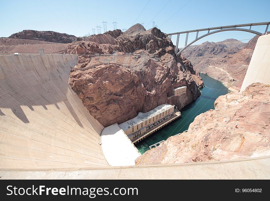 The Hoover Dam and Mike O'Callaghanâ€“Pat Tillman Memorial Bridge over the Colorado River between the states of Arizona and Nevada.
