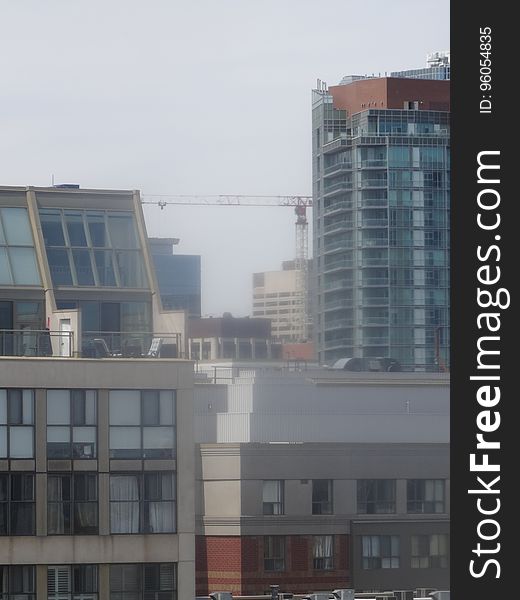 Distant construction cranes on Toronto&#x27;s skyline, 2016 05 11 -b