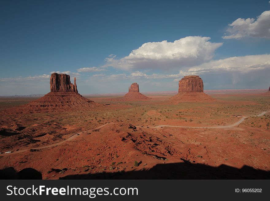 The West and East Mitten Buttes with the Merrick Butte in the Middle in Monument Valley. The West and East Mitten Buttes with the Merrick Butte in the Middle in Monument Valley.