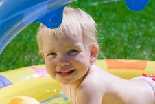 Little Girl In Yellow Pool Royalty Free Stock Images