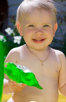 Little Girl In Yellow Pool Stock Photography