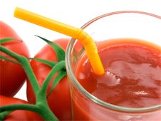 Tomato Juice And Tomato Close-up Royalty Free Stock Images