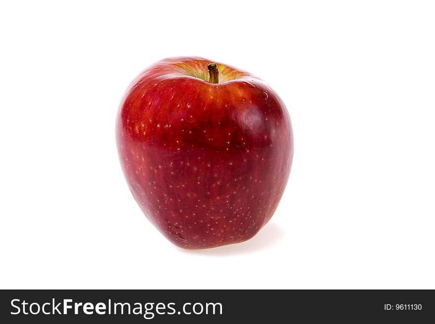 Ripe red apple on white ground