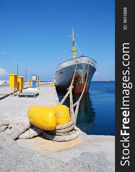 Old rusty water boat in a harbour in Greece. Old rusty water boat in a harbour in Greece