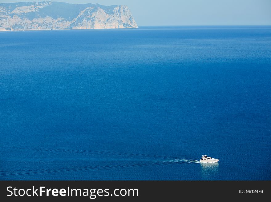 White Boat In Blue Sea