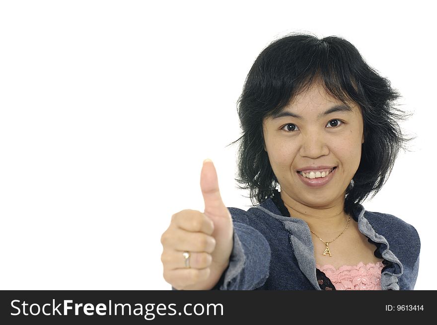 Confident smiling woman gives a thumb up. Confident smiling woman gives a thumb up