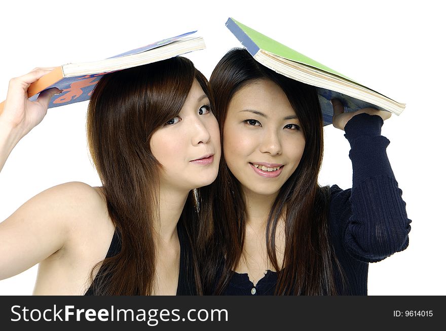Female smiling while carrying notebook. Female smiling while carrying notebook