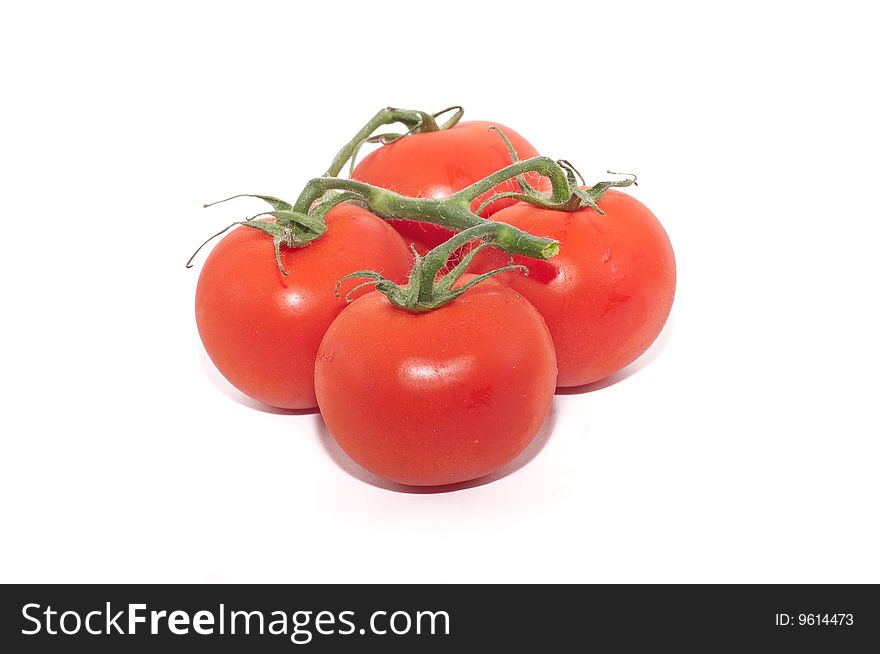 A group of cherry tomatoes isolated against a white background