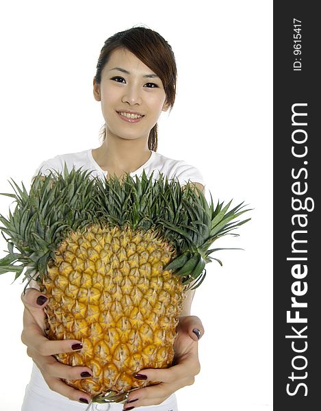 Asian young woman showing a healthy fruit. Asian young woman showing a healthy fruit
