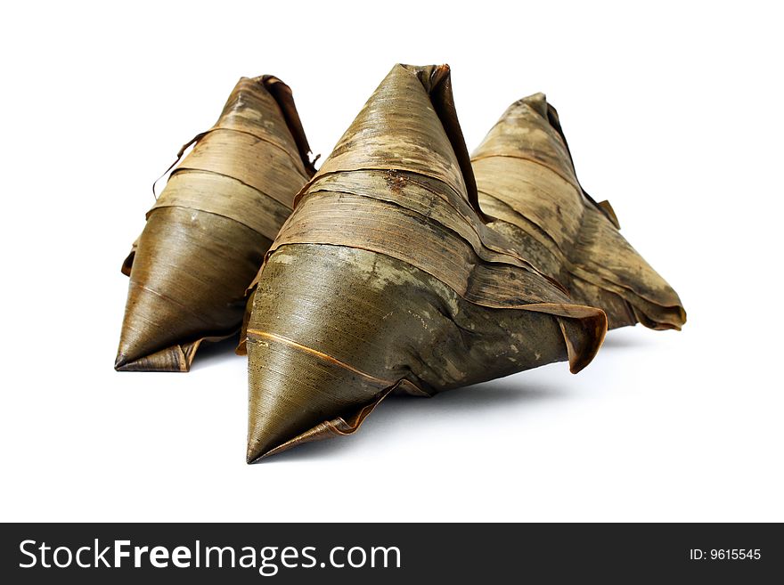 Three rice dumplings (Chinese traditional food) isolated on white background.