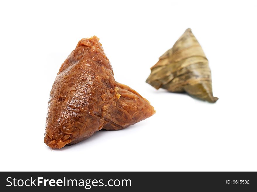 A unwrapped rice dumplings isolated from other over white background.