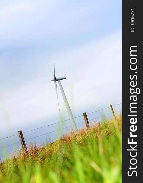 Modern windmill in the fields, springtime