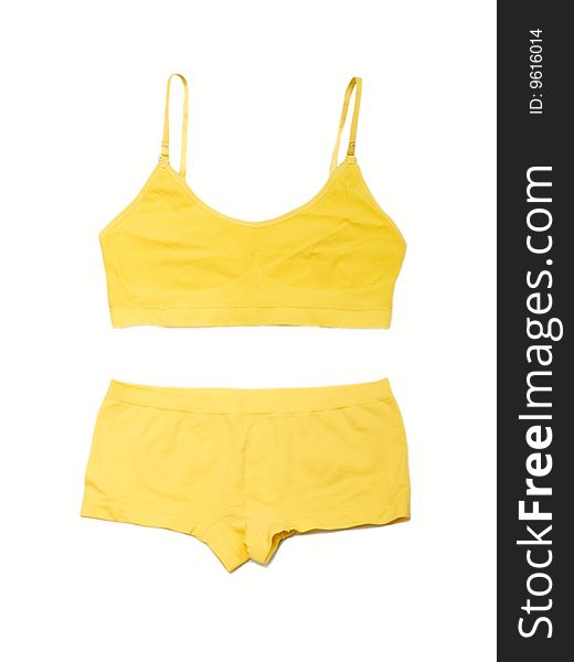 Yellow lingerie on the white background. Yellow lingerie on the white background