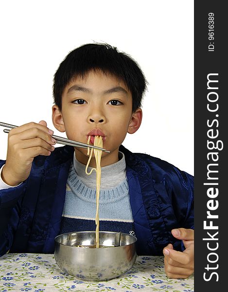 Boy with plate of vermicelli. Boy with plate of vermicelli