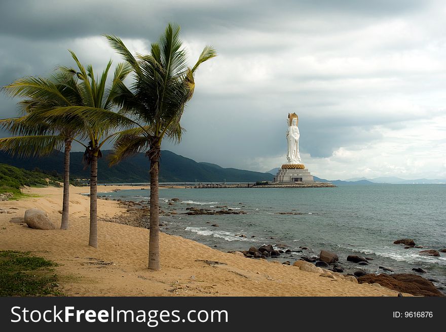 Enormous statue Budda on background storm sky